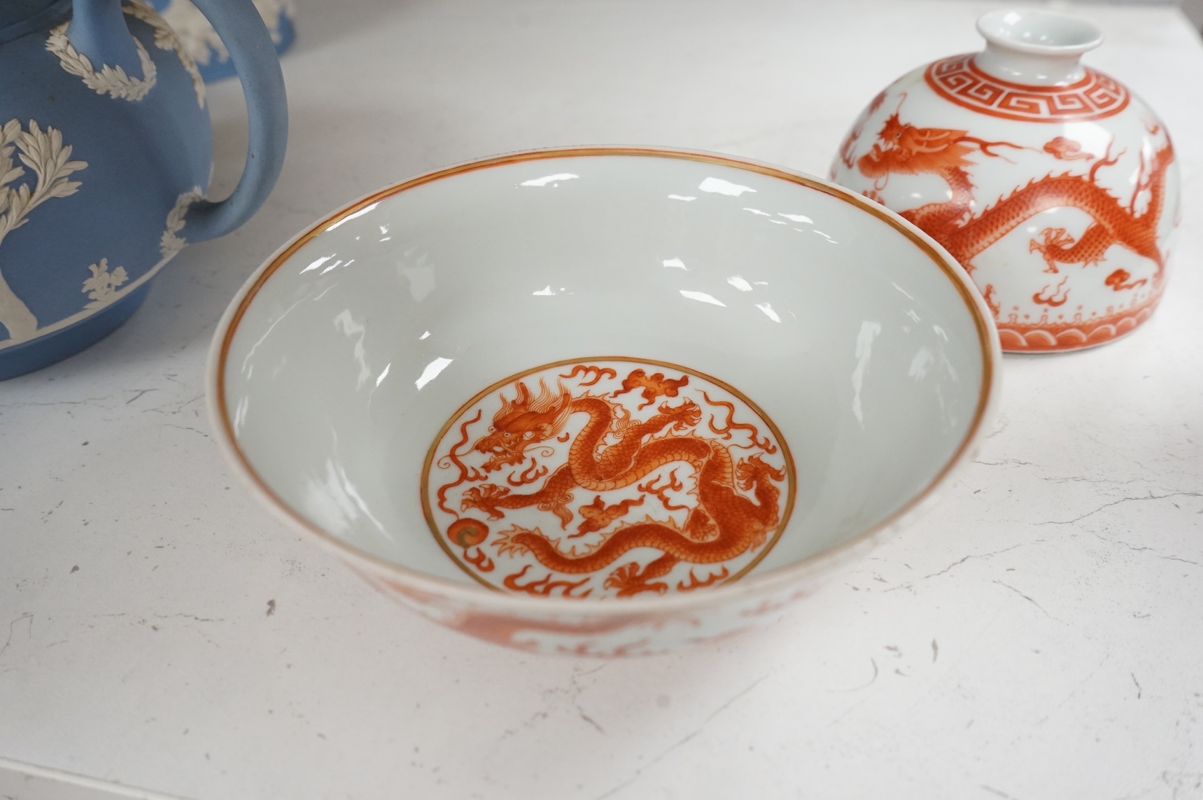 A Chinese rouge de fer dragon bowl, and a similar beehive water pot, Qianlong and Daoguang seal marks but later, bowl 15.5cm diameter